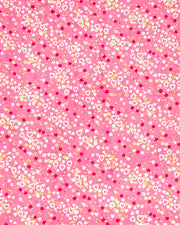 Japanese chiyogami paper featuring white hearts, small white, red, and yellow flowers, and metallic gold cherry blossoms on a pink background.