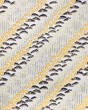 Japanese chiyogami paper featuring orange plum blossoms, black pine, and green bamboo on a metallic silver background with metallic gold details.