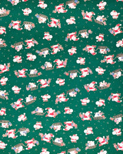 Japanese chiyogami paper featuring cartoon Santas in red outfits pulling sleds with presents and carrying sacks of presents on a green background with metallic gold details. 