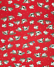 Japanese chiyogami paper featuring cartoon Santas in green outfits pulling sleds with presents and carrying sacks of presents on a red background with metallic gold details. 