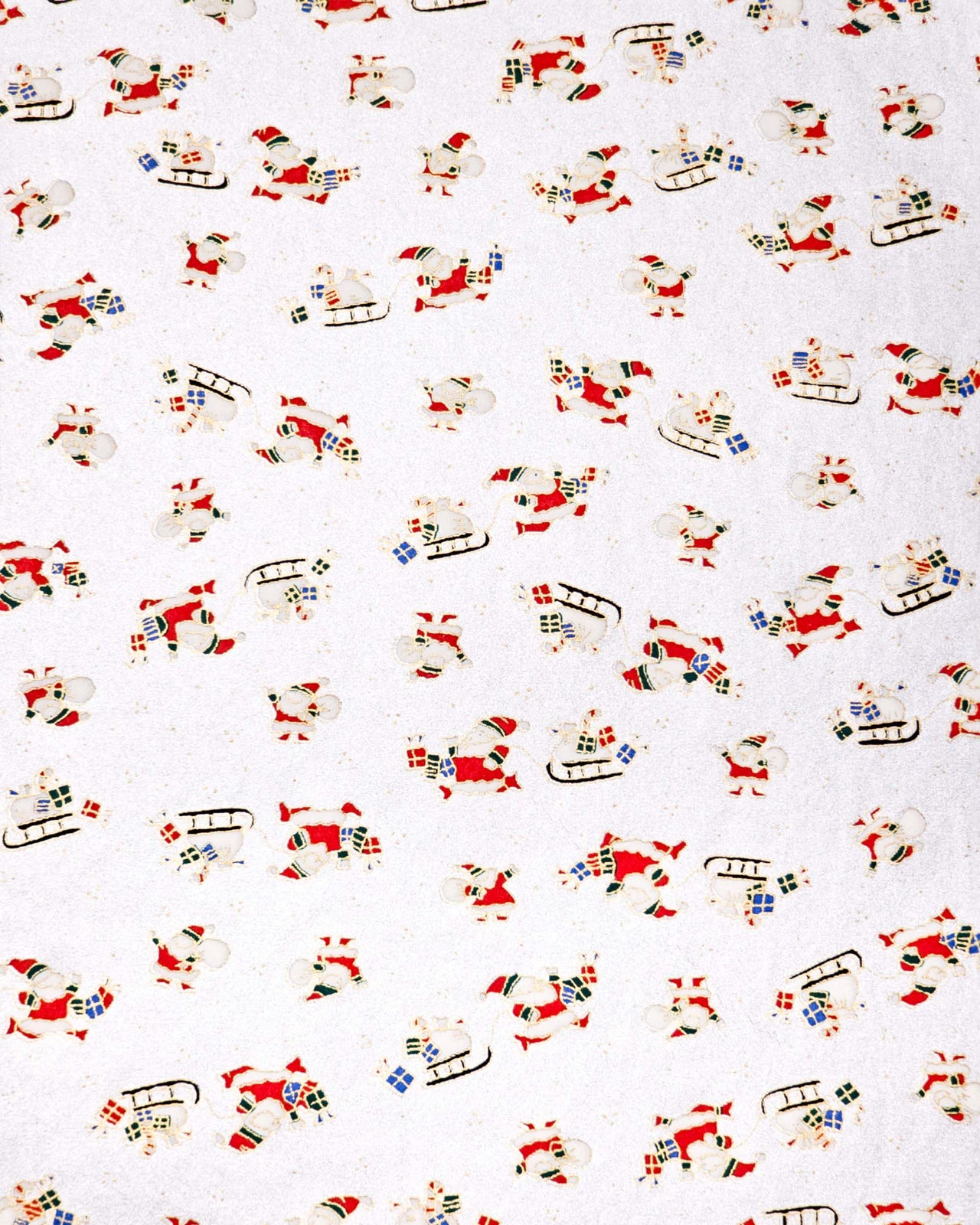 Japanese chiyogami paper featuring cartoon Santas in red outfits pulling sleds with presents and carrying sacks of presents on a metallic silver background with metallic gold details. 