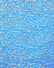 Japanese chiyogami paper featuring small metallic gold waves (aranami) on a royal blue background.
