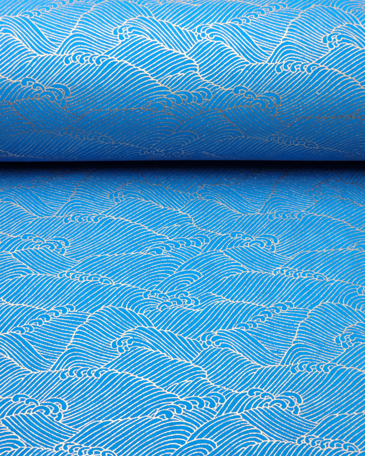 Japanese chiyogami paper featuring metallic gold waves (aranami) on a royal blue background.