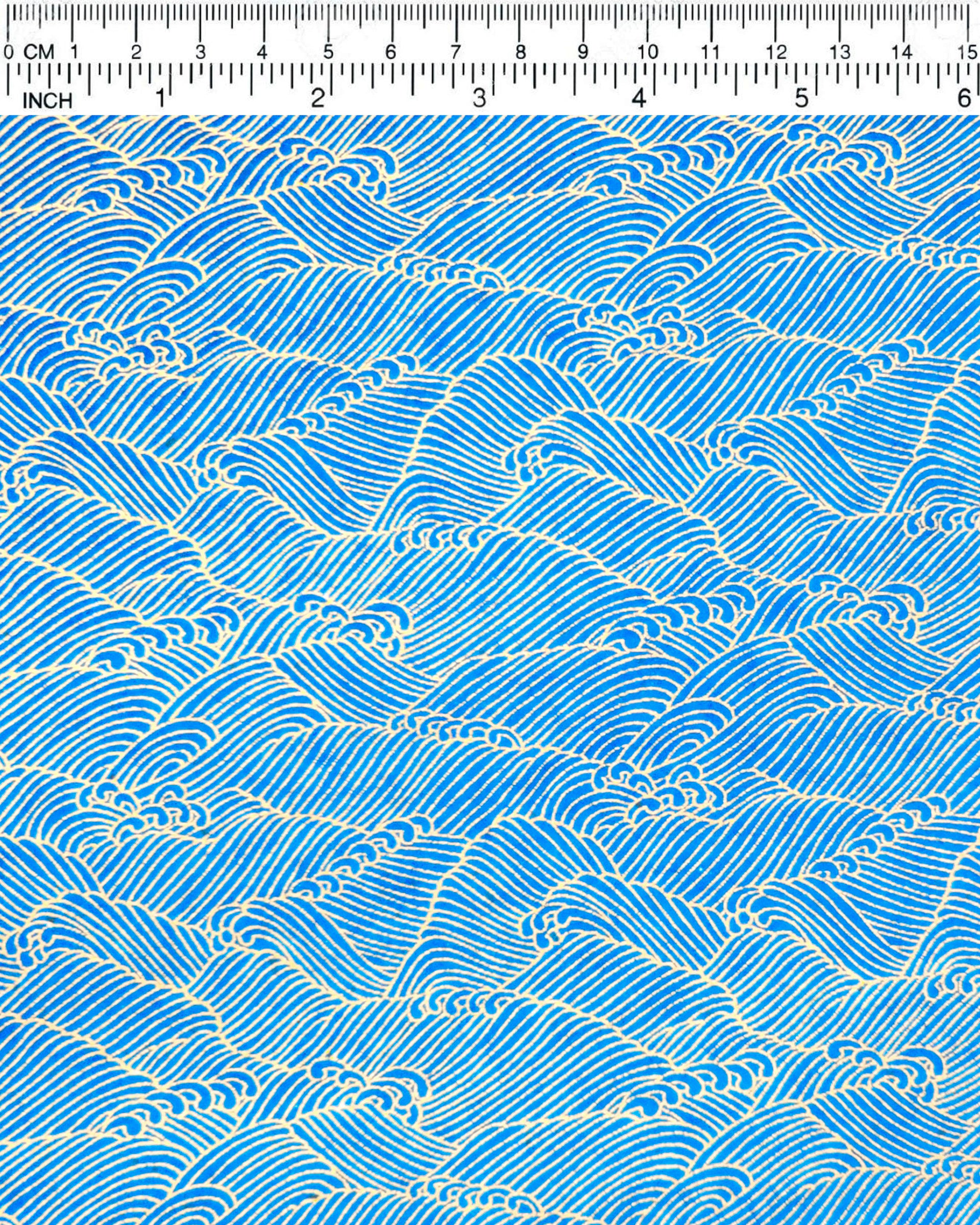 Japanese chiyogami paper featuring metallic gold waves (aranami) on a royal blue background.