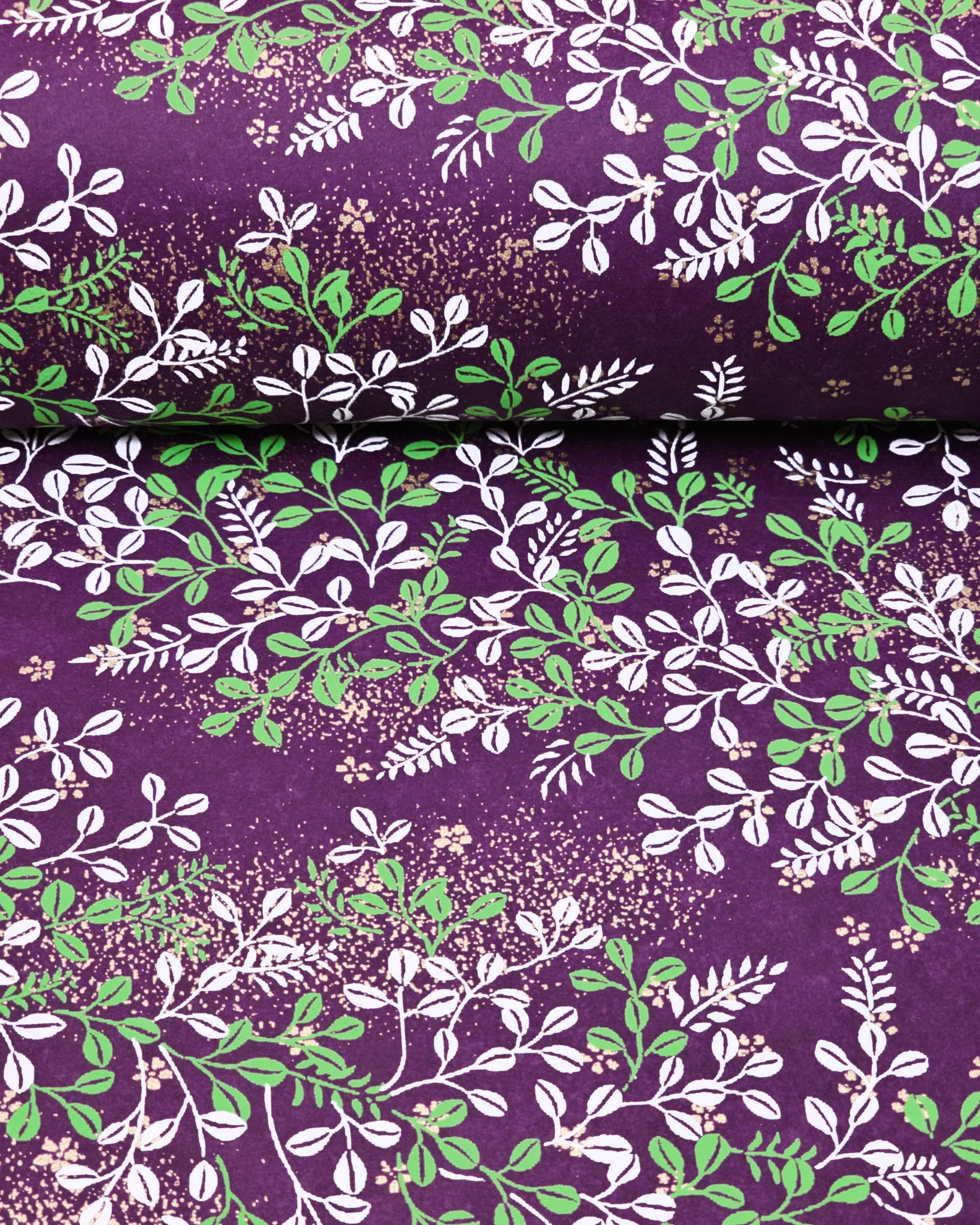 Japanese chiyogami paper featuring green and white hagi (bush clover) on a purple background with metallic gold details.