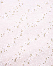 Japanese chiyogami paper featuring small white and metallic gold cherry blossoms on pearlescent pink background with metallic silver details.