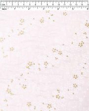 Japanese chiyogami paper featuring small white and metallic gold cherry blossoms on pearlescent pink background with metallic silver details.