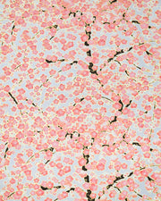 Japanese chiyogami paper featuring pink and white plum blossom trees with dark brown branches on a silver background with metallic gold details.