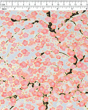 Japanese chiyogami paper featuring pink and white plum blossom trees with dark brown branches on a silver background with metallic gold details.