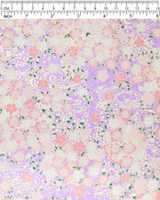 Japanese chiyogami paper featuring pink and white cherry blossoms on a pearlescent light purple background with metallic gold details.