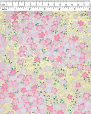 Japanese chiyogami paper featuring pink and white cherry blossoms on a metallic gold background.
