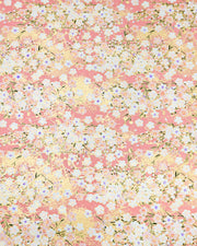 Japanese chiyogami paper featuring light pink and white cherry blossoms on a pink background with metallic gold details. Some of the white cherry blossoms have purple centers.