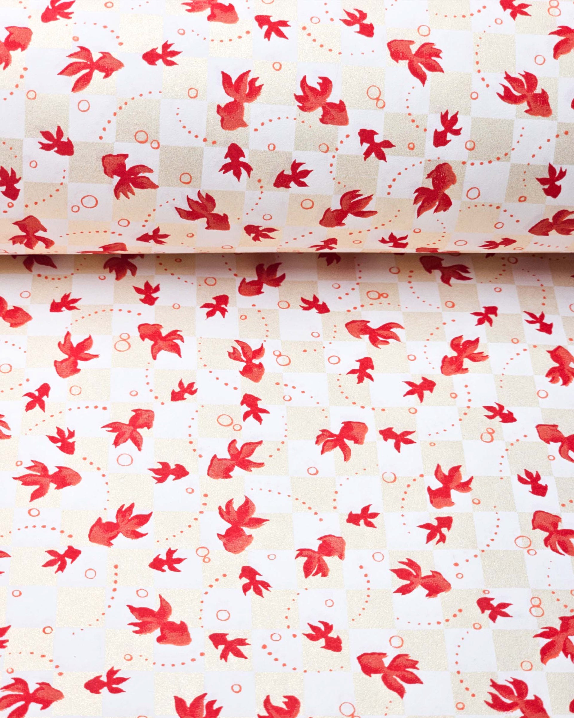 Japanese chiyogami paper featuring red koi fishes on a white and pearlescent beige ichimatsu (checker) background.