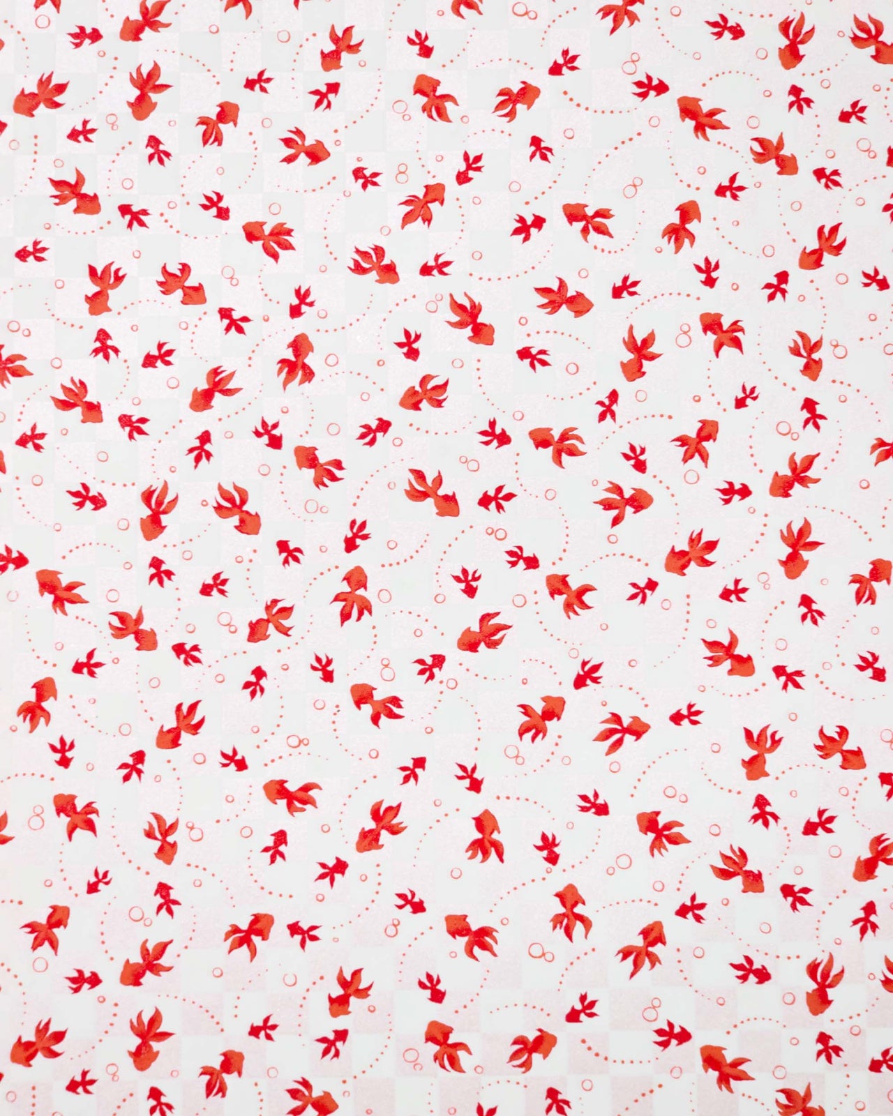 Japanese chiyogami paper featuring red koi fishes on a white and light pearlescent pink ichimatsu (checker) background.