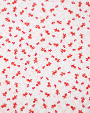 Japanese chiyogami paper featuring red koi fishes on a white and light pearlescent pink ichimatsu (checker) background.