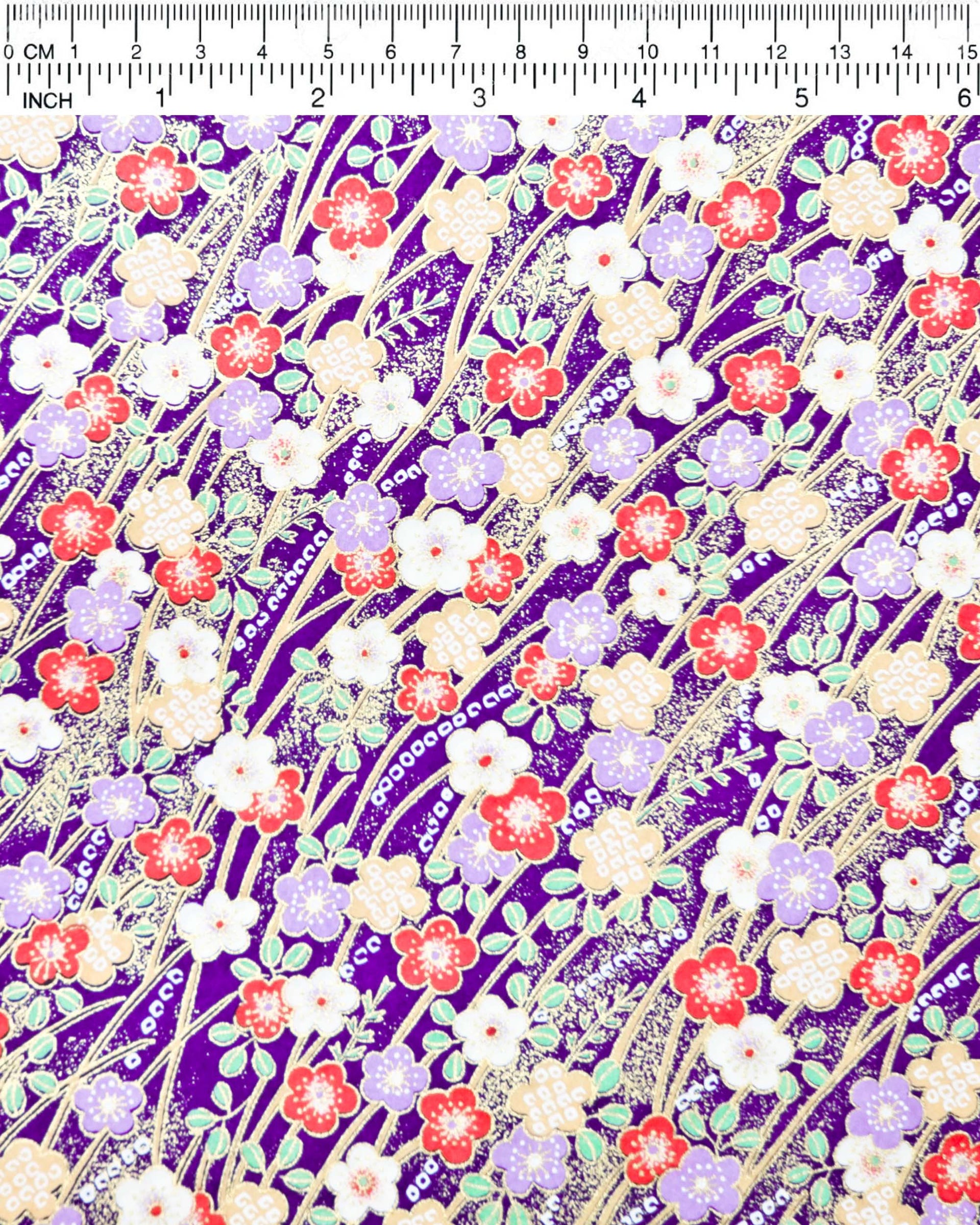This design features purple, red, white, and yellow plum blossoms on a purple background with metallic gold accents.