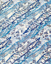 Japanese chiyogami paper featuring assorted blue and white flowers on a blue background with metallic gold accents.