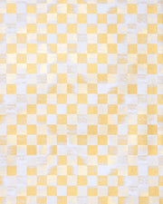 Japanese chiyogami paper featuring a metallic gold ichimatsu design on a white background.