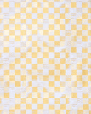 Japanese chiyogami paper featuring a metallic gold ichimatsu (checkered) design with a brushed effect on a white background.