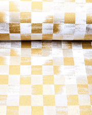 Japanese chiyogami paper featuring a metallic gold ichimatsu (checkered) design with a brushed effect on a white background.
