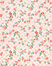 Japanese chiyogami paper featuring yellow, red, and white flowers with green leaves on a light orange ichimatsu (checkered) background with metallic gold accents.