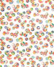 Japanese chiyogami paper featuring yukiwa (snowflake) with various floral and geometric designs on a pearlescent white background with metallic gold accents.