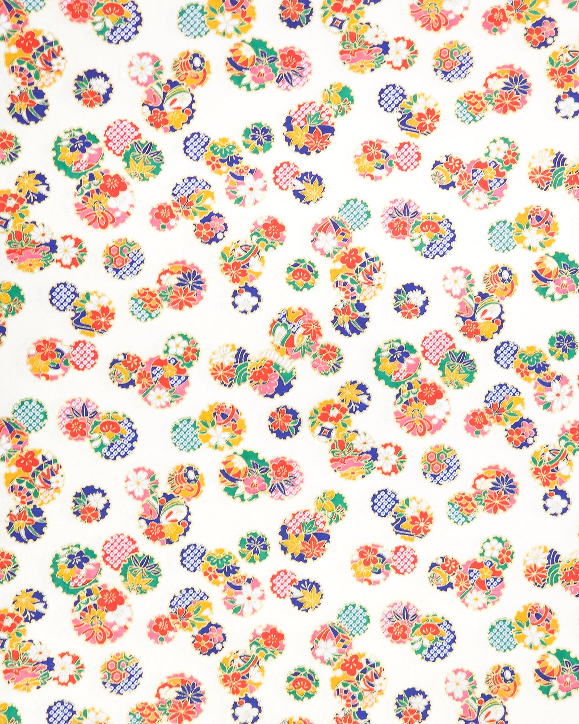 Japanese chiyogami paper featuring yukiwa (snowflake) with various floral and geometric designs on a pearlescent white background with metallic gold accents.
