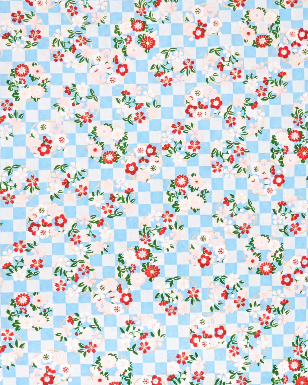 Japanese chiyogami paper featuring light pink, red, and white flowers with green leaves on a light blue ichimatsu (checkered) background with metallic gold accents.