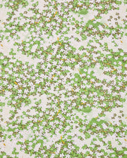 Japanese chiyogami paper featuring green and white cherry blossoms with light green branches on a green background with metallic gold accents.