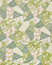 Japanese chiyogami paper featuring green, beige, and white floral patches with metallic gold accents.