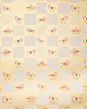 Japanese chiyogami paper featuring white horses with red and green accents and white assorted traditional Japanese designs in an ichimatsu (checker) design on a metallic gold background.