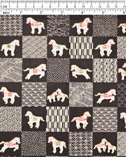 Japanese chiyogami paper featuring white horses with red and green accents and beige assorted traditional Japanese designs in an ichimatsu (checker) design on a black background with metallic gold accents.