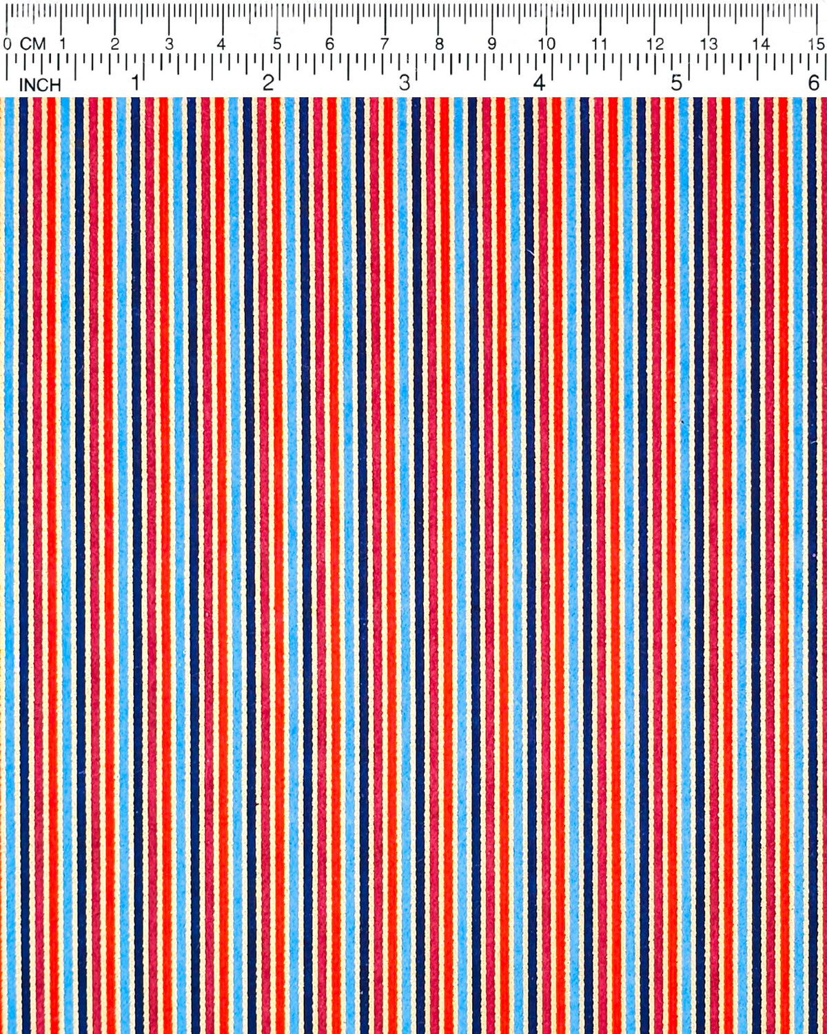 Japanese chiyogami paper featuring red, maroon, navy, blue and metallic gold thin vertical stripes, shown next to a ruler for size reference.
