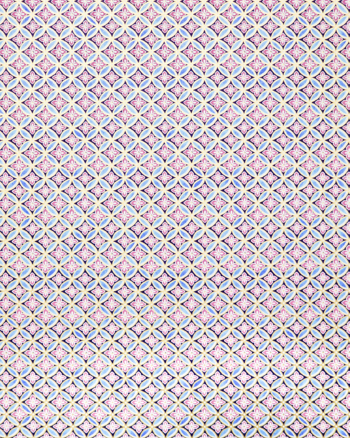 Japanese chiyogami paper featuring a blue and metallic gold shippo pattern with purple and white hanabishi (flower diamond) pattern in the center on a black background.