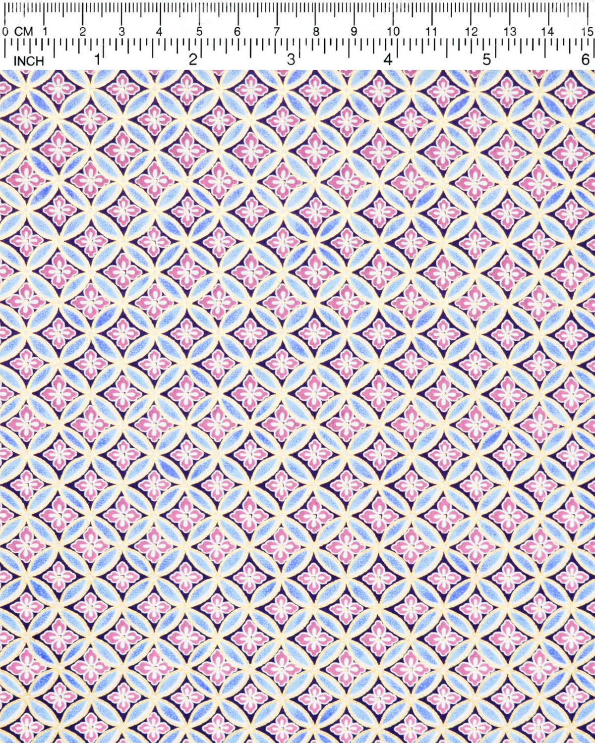 Japanese chiyogami paper featuring a blue and metallic gold shippo pattern with purple and white hanabishi (flower diamond) pattern in the center on a black background, shown next to a ruler for size reference.