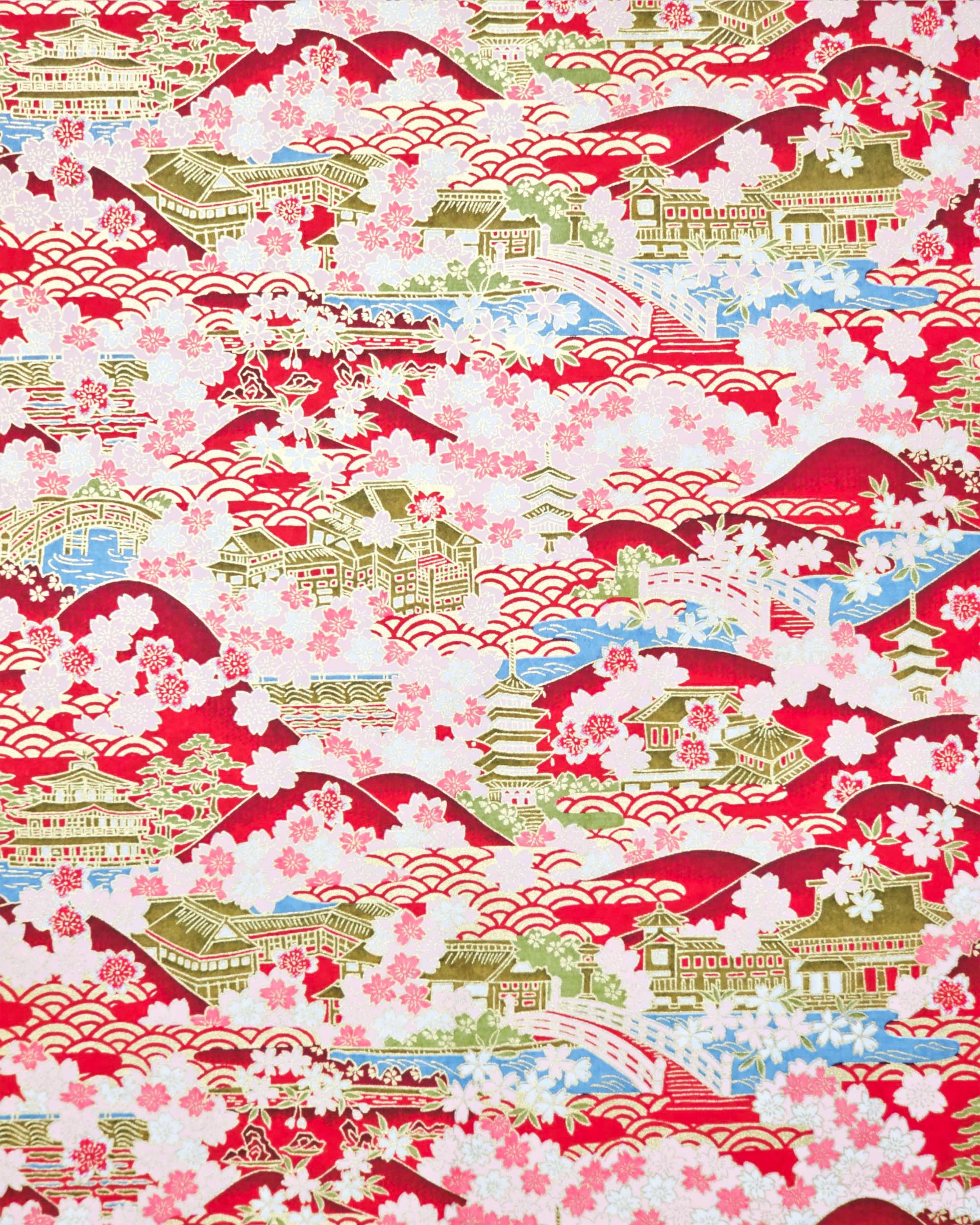 Japanese chiyogami paper featuring a red and pink cherry blossom-filled Japanese village with metallic gold accents.