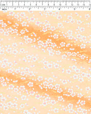 Japanese chiyogami paper featuring small white plum blossoms and matsuba (pine needles) on an orange gradient background with metallic gold accents.