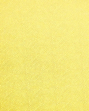 Japanese chiyogami paper featuring a metallic gold "same komon" (sharkskin) design on a bright yellow background.