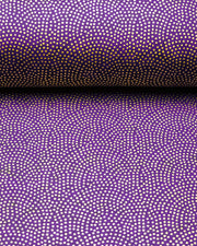 Japanese chiyogami paper featuring a metallic gold "same komon" (sharkskin) design on a dark purple background.