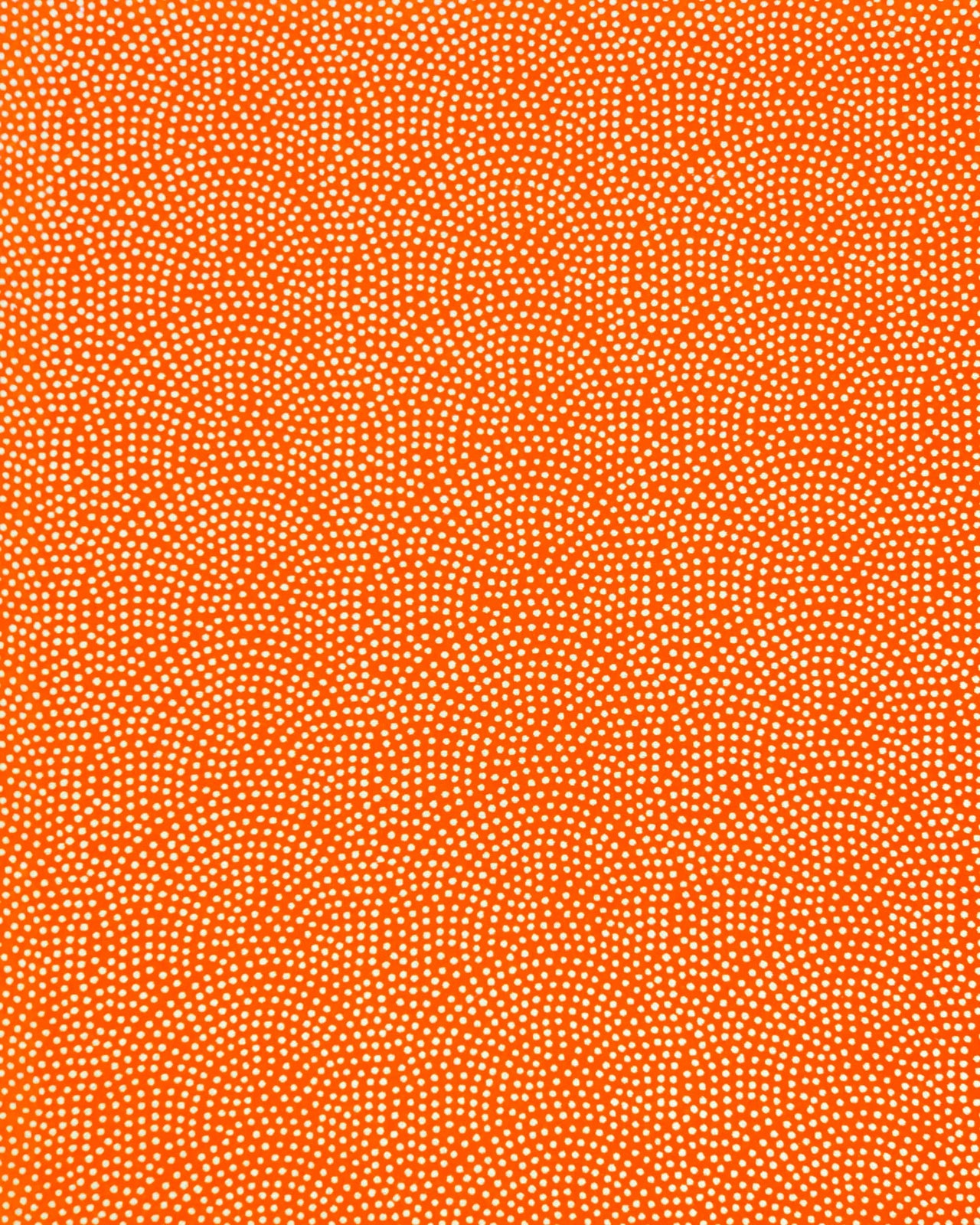 Japanese chiyogami paper featuring a metallic gold "same komon" (sharkskin) design on an orange background.