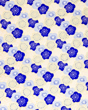 Japanese chiyogami paper featuring large dark blue, light blue, and off-white plum blossoms on a metallic gold background.