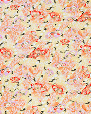 Japanese chiyogami paper featuring red and purple floral hand fans and gold floral ribbons on an orange gradient background covered in small white plum blossoms with metallic gold details.
