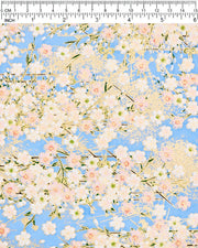 Japanese chiyogami paper featuring light pink and white cherry blossoms on a sky blue background with metallic gold details.