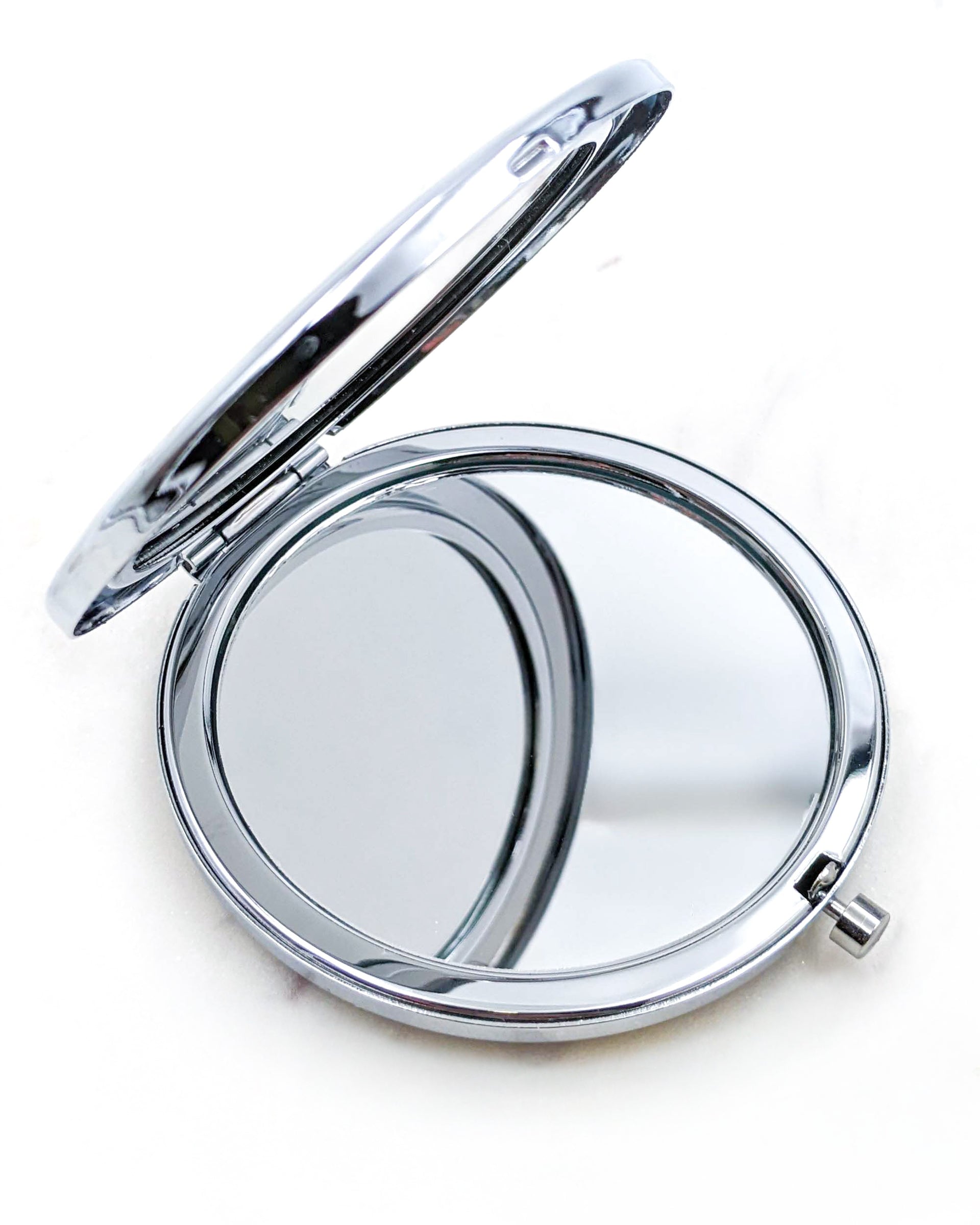 Opened compact mirror