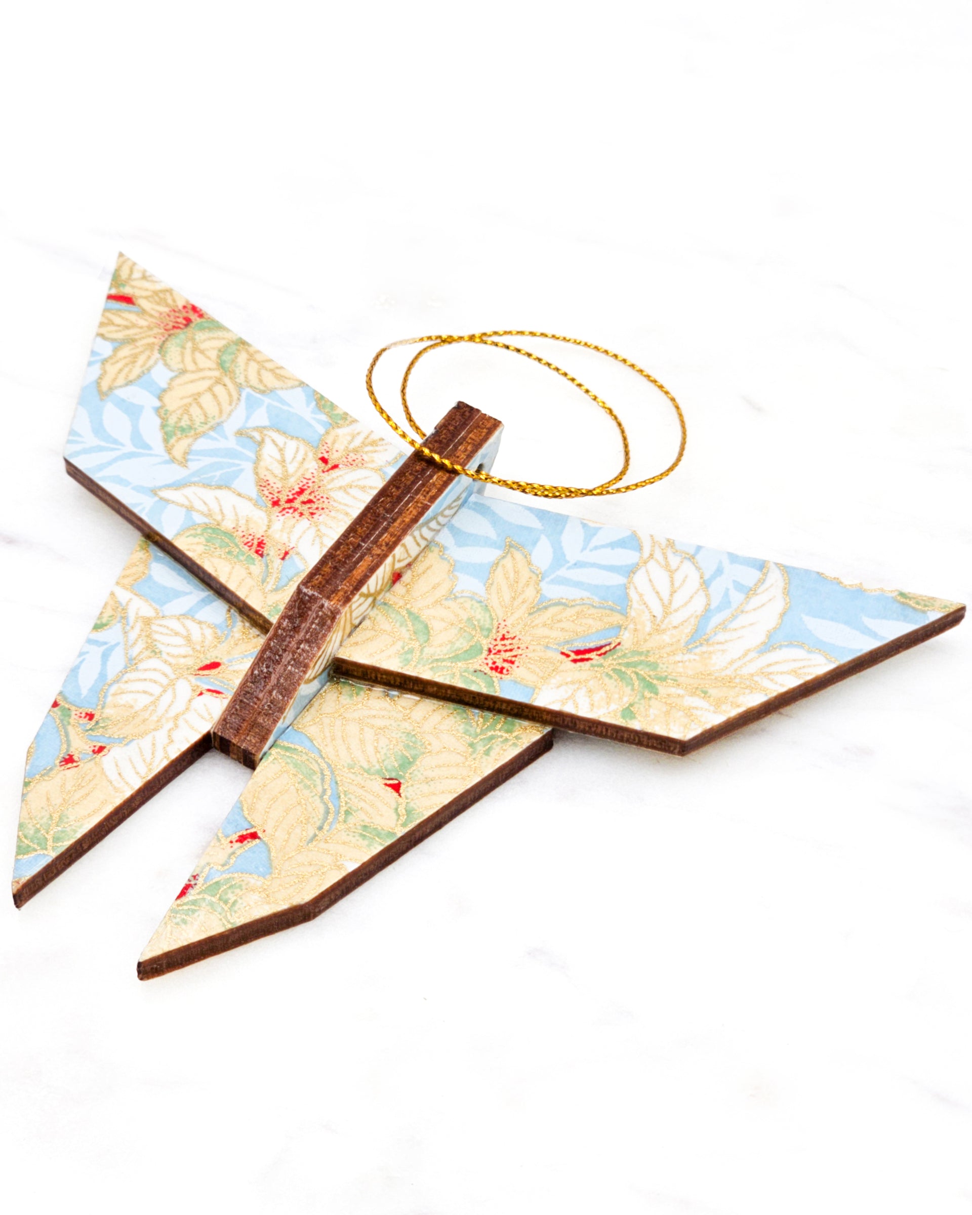 Large wooden origami butterfly ornament featuring beige, white, and red leaves on a light blue background with metallic gold details.