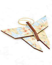 Large wooden origami butterfly ornament featuring beige, white, and red leaves on a light blue background with metallic gold details.