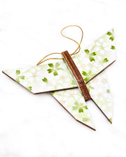 Large wooden origami butterfly ornament featuring white and green cherry blossoms on a white and light green background with metallic gold details.