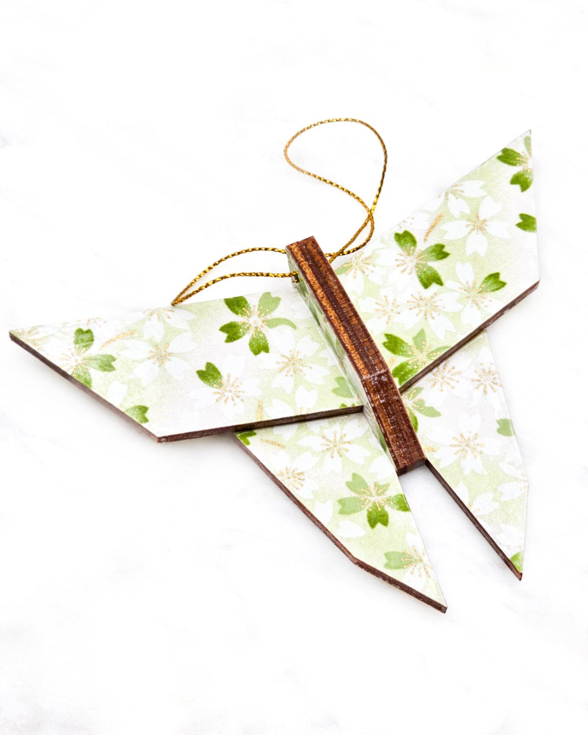 Large wooden origami butterfly ornament featuring white and green cherry blossoms on a white and light green background with metallic gold details.