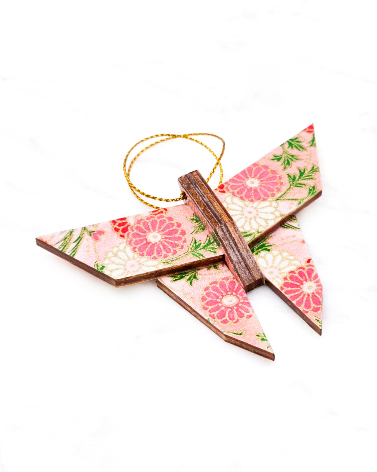 Small wooden origami butterfly ornament featuring pink, white, and red chrysanthemums with green leaves on a pink background with metallic gold accents.