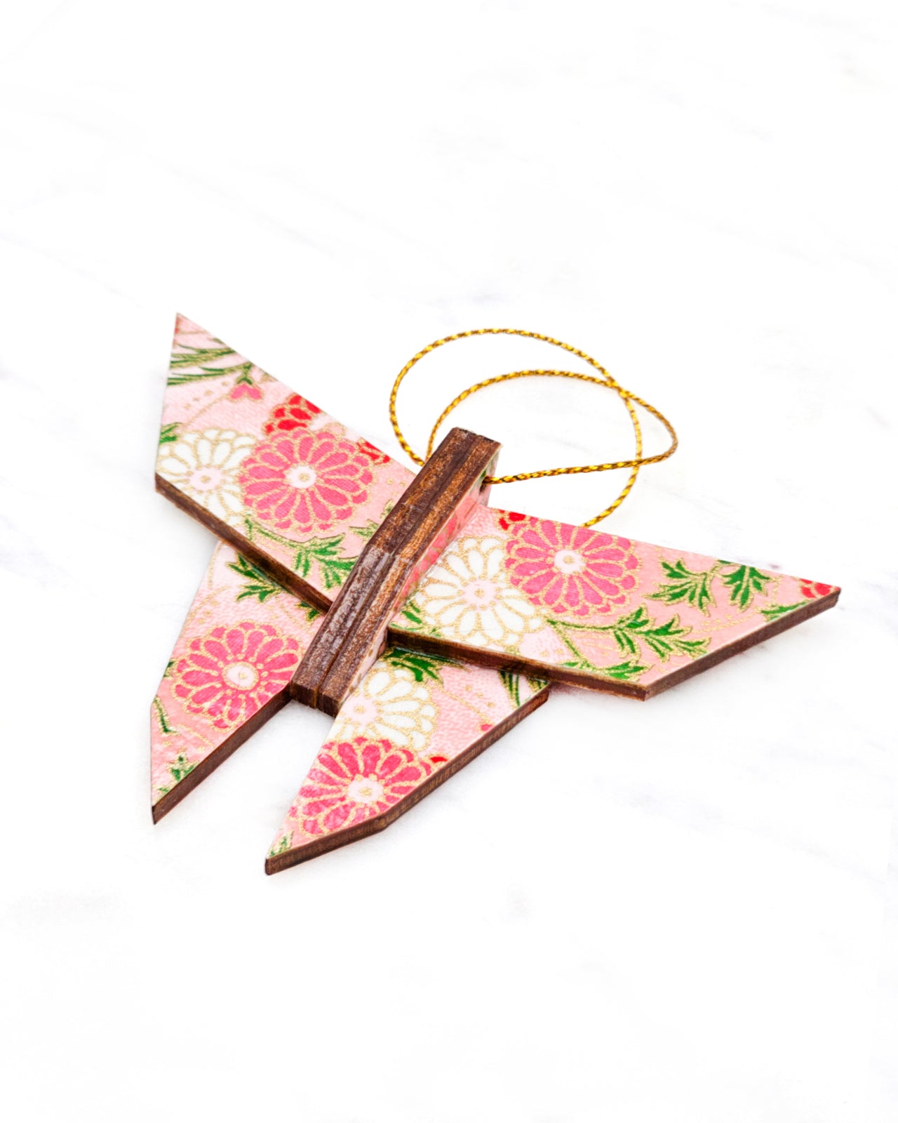 Small wooden origami butterfly ornament featuring pink, white, and red chrysanthemums with green leaves on a pink background with metallic gold accents.